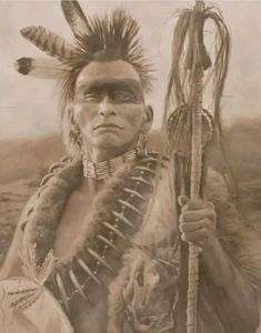 an old photo of a native american man