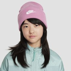 Turn chilly days into cozy ones with our Nike Peak beanie. Made from softly knit yarn, it has a fold-over cuff that lets you personalize your look. Nike Winter Beanie Hat, Casual Spring Beanie, Nike Casual Winter Hats, Casual Nike Winter Hat, Casual Soft Cap, Casual Soft Solid Color Beanie, Trendy Pink Cotton Beanie, Casual Super Soft Winter Hats, Pink Knitted Casual Hat