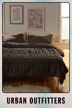 an image of a bed with the words urban outfitters on it