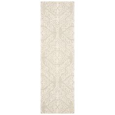 a white rug with an intricate design on the bottom and bottom, in front of a white background