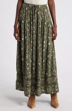 Pure prairie breezes waft through a swingy skirt closed with a drawstring and accented with lilts of lace. 38" length (size Medium) Elastic/drawstring waist Unlined 100% viscose Machine wash, dry flat Imported Patchwork Skirt Pattern, Green Skirt Outfits, Maxi Skirt Winter, Cottage Core Dresses, Olive Green Skirt, Women's A Line Dresses, Patchwork Skirt, Floral Maxi Skirt, Long Maxi Skirts