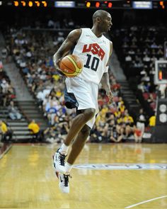 a basketball player is running with the ball