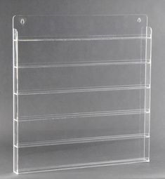 "GlamoureBox is a major player in the beauty and cosmetic organization industry. Feast your eyes on our 108 bottle nail polish organizer. If you own a nail polish salon or just have way too many nail polishes, this wall rack will help you get organized quick.  DIMENSIONS 22.5\" L x 2\" W x 23.8\" H 100% USA materials, assembled by hand in California Quality and affordability you can see Polished edges! Reinforced acrylic design prevents damage during shipping! Strong frame for durability yet lig Nail Polish Wall, Nail Polish Wall Rack, Hanging Wall Organizer, Wand Organizer, Houses Architecture, Nail Polish Rack, Acrylic Nail Polish, Clear Acrylic Nails, Polish Display