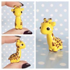 a yellow giraffe figurine sitting on top of a person's finger