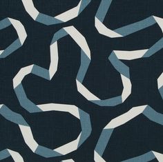 an abstract blue and white fabric with wavy lines on it's back ground,