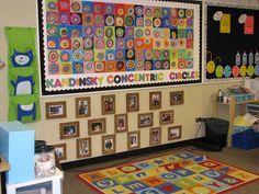 a classroom with posters and pictures on the wall