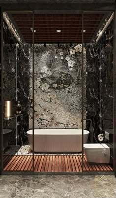 a bathroom with marble walls and flooring next to a bathtub in the middle