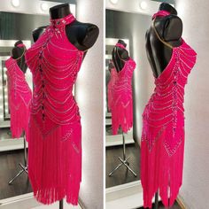 a mannequin dressed in pink with beads and fringes on it's back