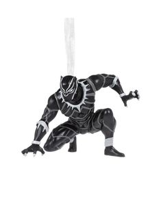 a toy figurine that looks like a black panther with white stripes on it