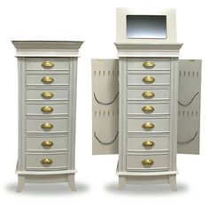 two tall white chests with gold handles and knobs on each drawer, one has a mirror above the drawers