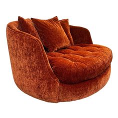 a large round chair with two pillows on it's back and the seat upholstered