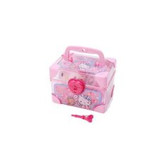 a pink hello kitty lunch box with handle