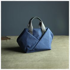 Overview： Design: Cute Womens Blue Nylon Small Handbag Purse Unique Nylon Blue Handbag Purse for LadiesIn Stock: Ready to Ship (2-4 days)Include: Only BagCustom: NoColor:, Blue,Leather: Cowhide, Nylon Measures: 23cm x 20cm x 17cmWeight: 0.58kgSlots: 1 main slot, 1 zip slot, 1 side slot, 1 phone slotAccessories(option): NoneStyle: Cute Womens Blue Nylon Small Handbag Purse Unique Nylon Blue Handbag Purse for Ladiesit should last a life time Note： Each item will have very slight variances to the p Main Slot, Overview Design, Bags Sewing, Blue Handbag, Unique Handbags, Needle Felting Tutorials, Cute Womens, Blue Handbags, Felting Tutorials