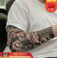 a man with a tattoo on his arm