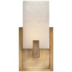 a wall light with a white glass shade