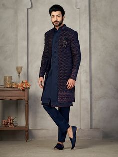 Blue  Colour Handcrafted front open Designer Indowestern for men with elegant kurta inside made from the finest silk fabric will make you feel like a king on the happiest & most important day of your life.you can customize it according to your measurement as the fitting make it more beautiful to wear.Its beautifully hand embroidered and zari work all over and on sherwani shwal.Elegant sherwani for groom,groom sherwani,sherwani for men sherwani men,indowestern for men,Indowestern For Men, COST INCLUDED SHERWANI ,TROUSER & KURTA AS IN THE PICTURE Long Wedding Sets For Winter, Bollywood Style Sherwani For Wedding In Winter, Bollywood Style Sherwani For Winter Weddings, Bollywood Style Wedding Sherwani For Winter, Groom Dress For Wedding, Indowestern Men, Men Wedding Sherwani, Indo Western Outfits For Men, Men Wedding Dress