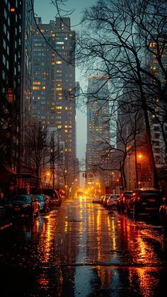 a city street at night in the rain