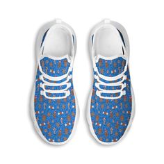 a pair of blue shoes with white laces and flowers on the bottom, against a white background