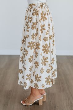 Details: Perri Floral Midi Skirt Midi Skirt High Rise Elastic Back Waist Side Pockets Lined Side Zipper Closure Floral Pattern No Stretch Relaxed Fit Available in Cream Length: 32" Material: Self: 85% Polyester and 35% Rayon Lining: 100% Rayon We are recommending: Small - Sizes (25-26) Medium - Sizes (27-28) Large - Sizes (29-30) Skirt And Top Outfits Classy, Floral Print Flowy Midi Skirt, Casual Non-stretch Floral Maxi Skirt, Skirt And Top Outfits, Casual Midi-length Skirt With Floral Print, Relaxed Midi-length Rayon Skirt, Long Floral Print Skirt, Relaxed Fit, Feminine Things, Teacher Fits