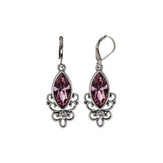 Add a pop of vintage-style glamour to your outfit with this pair of silver-tone filigree drop earrings. With colored stone and cool silver-tones, these pierced earrings have a perfect combination of vintage and modern style. These filigree earrings are available in White, Pink, Clear Crystal, Blue, Purple, Light Purple, Green, and Black. Measurements: 1.72"L x 0.57"W Made In USA 1928 Jewelry Collection From the vaults of rich European capitals to the antique laden attics of old American estates, Channel Jewelry, Chic Fashionista, Antique Filigree, Everyday Casual Outfits, 1928 Jewelry, Vintage Inspired Jewelry, Colored Stone, Filigree Earrings, Drop Earring