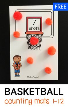 a basketball counting mat with orange pom poms