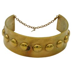 THIERRY MUGLER vintage textured gold tone choker necklace embellished with domes. Comes from a French private THIERRY MUGLER jewelry collection. Lobster clasp closure. Metal tag embossed TM. Indicative measurements : min. inner circuference approx. 35.19 cm (13.85 inches) / max. inner circumference approx. 37.07 cm (14.59 inches) / width approx. 4.1 cm (1.61 inches) / neck opening approx. 8.5 cm(3.35 inches). Material : Gold tone metal hardware. NOTES - This is a preloved vintage item, therefore Thierry Mugler, Metal Tags, Vintage Texture, Gold Choker, Choker, Gold Texture, Jewelry Inspo, Gold Tone Metal, Vintage Gold