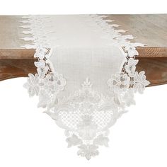 the table cloth is white and has lace on it