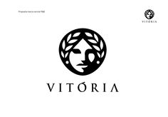 a black and white logo with the word victoria in it's center, surrounded by leaves