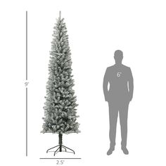 a man standing next to a tall white christmas tree with the measurements for it's height