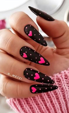 32. Black Nails Pink Hearts Last year, many of us didn't celebrate Valentine's day at all. With Valentine's Day coming up, if you have someone you're hoping to celebrate with this year while you’re planning an epic Valentine’s Day ideas to celebrate your love, you will need to look pretty t... Pink And Beige Nails, Simple Valentines Day Nails Acrylic, Dark Valentines Day Nails, Trendy Valentines Day Nails, Vday Nails, Cartoon Nails