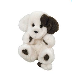 a white stuffed dog with brown spots on it's face and paws, sitting upright