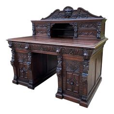 an old wooden desk with carved carvings on the top and bottom part, against a white background