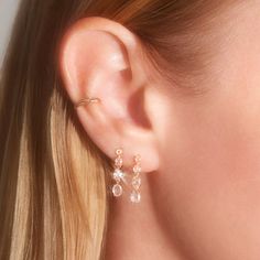 A woman with long blonde hair wears two earrings. They are two of the same style that has four diamonds connected by gold. Personalized Gold Bracelet, Catbird Jewelry, Pearl And Diamond Earrings, Swan Lake, Gold Bracelet Chain, Tennis Bracelet Diamond, Engagement Jewelry, Engagement Ring Wedding Band, Swans