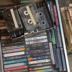 there are many cassettes in the bin together