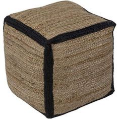 a small square ottoman made out of jute and black trim on the sides, with a contrasting color block at the top