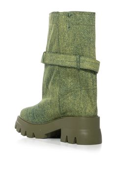 Put your trendiest foot forward in The AZALEA WANG Marceline Bucket Green Denim Bootie! This streetwear-inspired shoe is made with a colored denim upper and features a mid-calf shaft height, an almond toe silhouette, a ridged flatform sole, tonal stitching, and an elasticated side slit panel for ideal stretch. Complete with a strappy belted accent, a faux silver metal buckle, and an easy pull-on fit. (all measurements are approximate from size 8) - Denim Upper - Almond Toe - Mid-Calf Shaft Height - Ridged Flatform Sole - 2.5” Heel Height - 1.5” Sole Height - 9.25” Shaft Height - 14.25” Circumference - Imported Product ID: 380054 Azalea Wang, Colored Denim, Metal Buckles, Mid Calf, Heel Height, Street Wear, Heels, Boots, Green