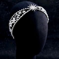 For winter brides, a touch of silver and sparkle is very much en vogue. It’s also an easy way to create a seasonal bridal look with a cheerful winter wonderland style, and this delicate headband / tiara does just that. Adorned with a combination of glowing Austrian crystals and ice flowers on a bright silver base, it gives your hair an extra touch of glam to finish off your perfect look on your perfect day. Cast in lightweight alloy and rhodium plated for a flawless finish, the headband measures Winter Bride, Headband Tiara, Bridal Tiara, Bridal Headband, Colored Wedding Dresses, Austrian Crystal, Wedding Hair Accessories, Bridal Looks, Hair Pieces