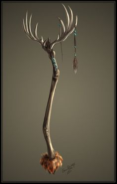 an antler with feathers hanging from it's back