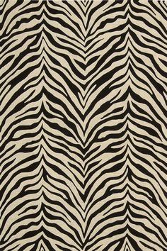 a black and white rug with zebra print