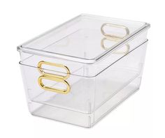 a clear plastic storage box with gold handles