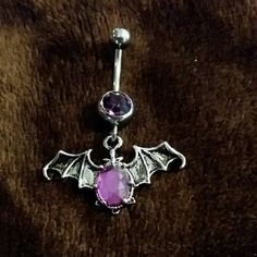 Silver Bat With Purple Rhinestone Belly Button Ring. New. Buy 2 Get One Free. The Lesser Value Will Be Free. Will Make A New Listing For Multiples Adjustable Silver Jeweled Body Jewelry, Adjustable Silver Gothic Belly Rings, Belly Jewellery, Future Jewelry, Belly Button Jewelry, Edgy Jewelry, Cool Piercings, Teeth Jewelry, Belly Jewelry