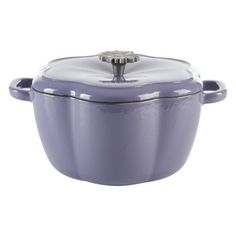 a purple casserole dish with a metal handle and lid on a white background