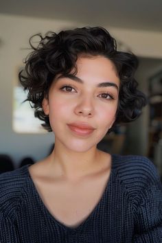 Cute black long pixie cut for naturally curly hair. Pixie Cut With Bangs