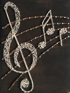 a metal treble with musical notes on it