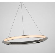 a circular light fixture hanging from the ceiling