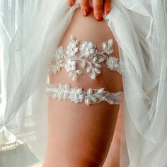 Introducing our exquisite Wedding Bridal Garter, the perfect touch of elegance and charm for every bride on her special day. This stunning wedding garter is not only a beautiful addition to your bridal attire but also a thoughtful and cherished gift for any bride-to-be. Ideal for bridal showers and bachelorette parties, this delicate piece will surely make the bride feel extra special and loved. Our Wedding Bridal Garters are meticulously crafted with high-quality materials to ensure comfort and Bridal Shower Gift Ideas, White Lace Garter, Perfect Bridal Shower Gift, Bride Garter, Lace Garter Set, Garter Wedding, Bride Attire, Shower Gift Ideas, Wedding Party Accessories