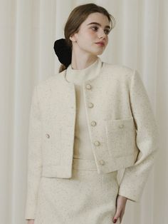 Editor's NotesThis product is a round-neck cropped jacket crafted from bouclé fabric, perfect for the holiday season with its textured yet simple mood. The jacket features a refined design with 100% premium bouclé material and a 2-ounce quilted lining. It is adorned with a gold chain button, adding a classic touch, and its cropped length makes it suitable for both casual and formal styles. The jacket pairs well with various inner garments and bottoms, making it versatile for daily wear to office Classic Cropped Winter Jacket, Blazer Outfits For Women Casual, Crop Blazer Outfit, Corporate Siren, Tweed Jacket Outfit, Peach Jacket, Corduroy Jacket Womens, Model Clothes, Sunday Outfit