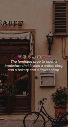 a bicycle parked in front of a building with a sign that reads cafe the feminine urge to open a bookstore that also a coffee shop and a bakery and a flower shop