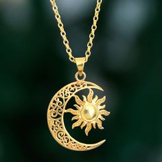 Crafted of 22k gold-plated sterling silver, the sun is caressed by the crescent moon in a sublime pendant necklace from India. Bhavya Jain designs the accessory, which features dot patterns on the sun's tendrils and openwork curl motifs within the moon, all polished for a captivating and radiant look. Moon Design Necklace, Sun And Moon Accessories, Sun Moon Pendant, Pendents Design, Hanna Core, Necklace Pendant Design, Moon And Sun Necklace, Innovative Jewellery, Sun And Moon Jewelry