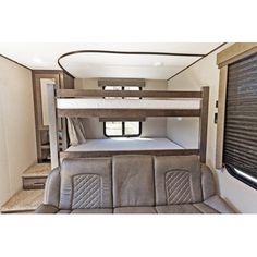 the interior of an rv with bunk beds